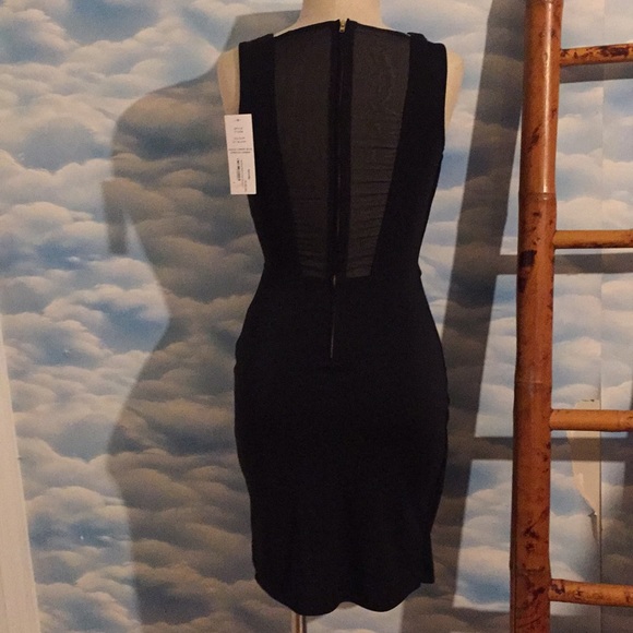 French Connection Dresses & Skirts - NWT French Connection size 2 black peekaboo dress